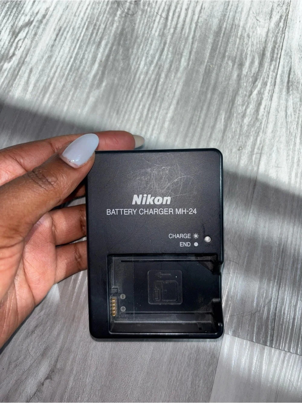 Nikon D3500 Black DSLR Camera with Black Zoom Lens and Red Accent
